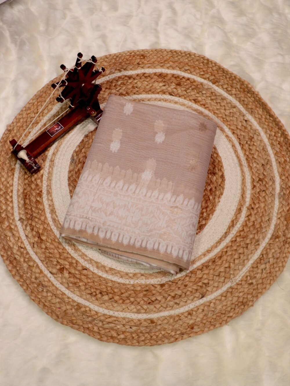 Sand Beige Chanderi Cotton Saree featuring allover Buttaas and fine texture with a refined finish for versatile wear